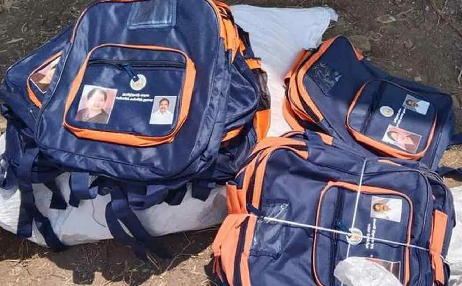 Case filed against former chief minister for distributing picture printed textbooks.