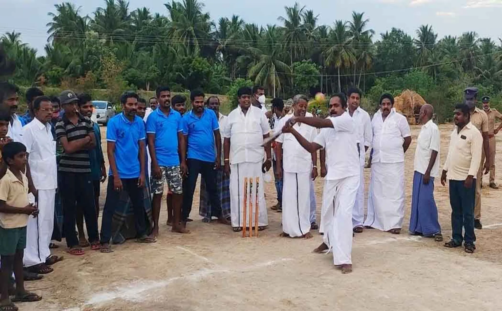 The minister who threw the ball ... the legislator who batted!
