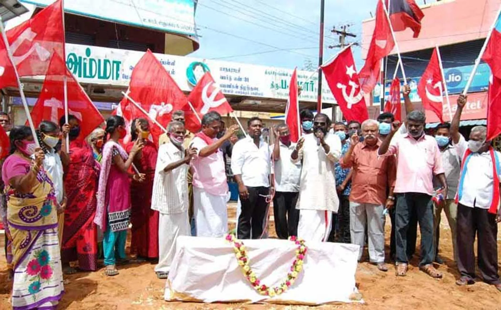 CPM parties set up graves and staged protests