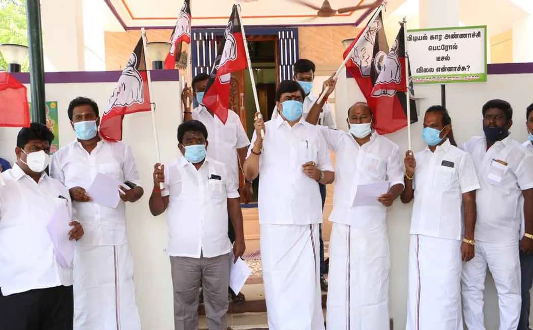 KD Rajendra Balaji participating in the protest carrying banners with slogans against DMK