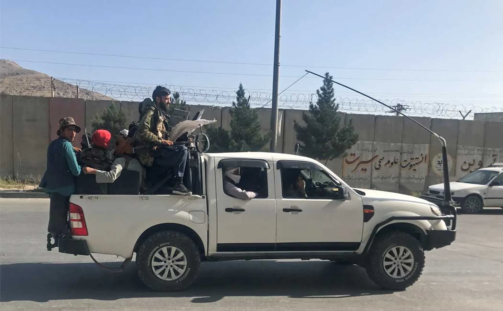 AFGANISTAN CAPITAL KABUL AIRPORT PEOPLES AND FOREIGNERS 