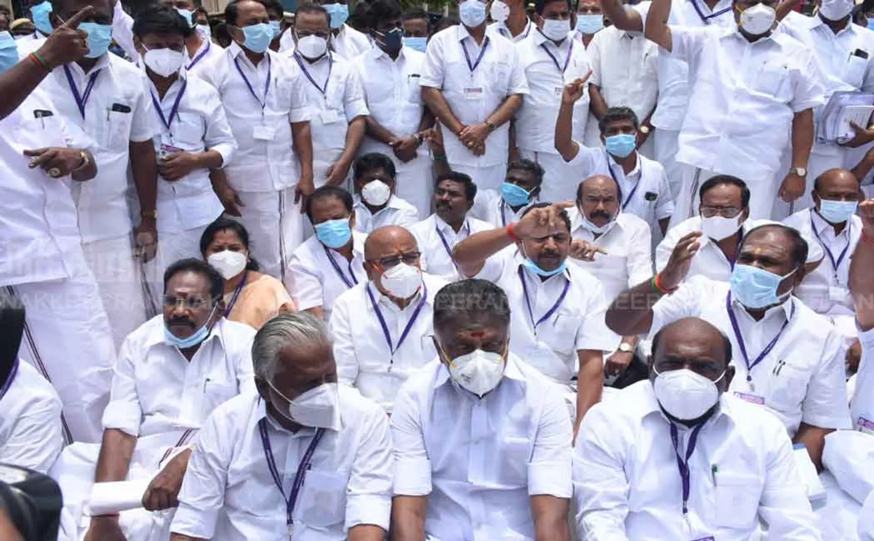 AIADMK MLAs sit on the road 