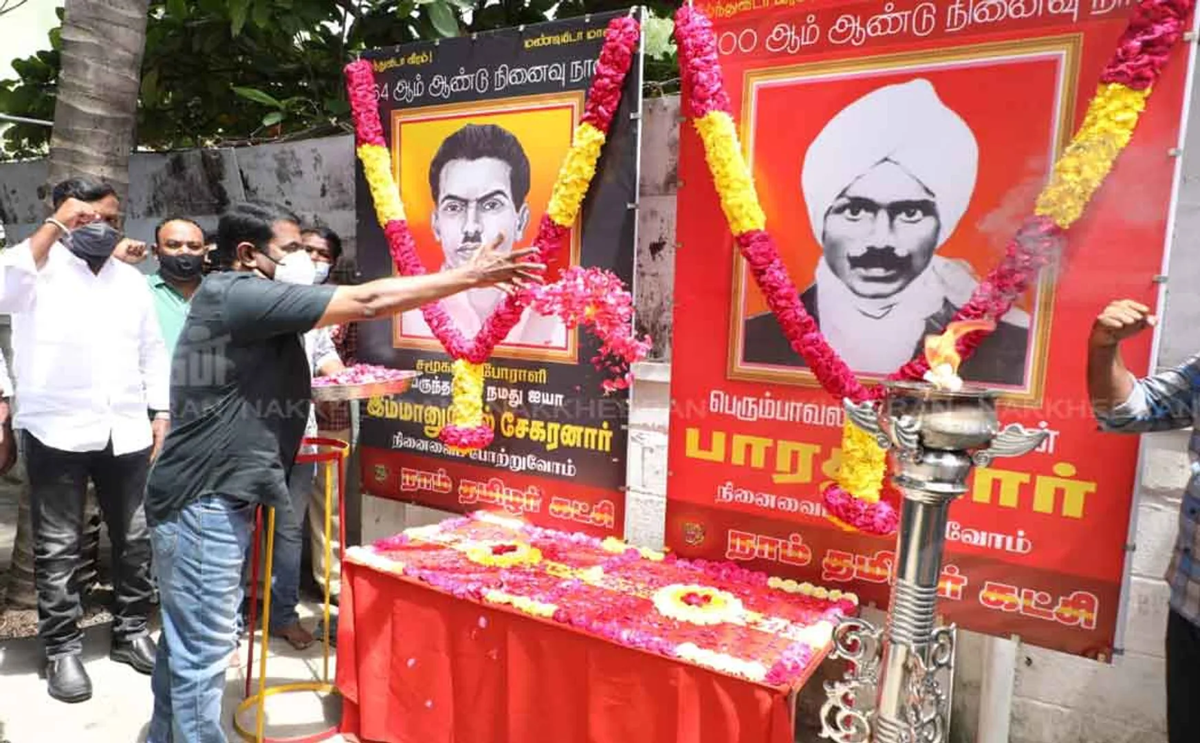 Seeman pays floral tribute to Bharathiyar portrait 