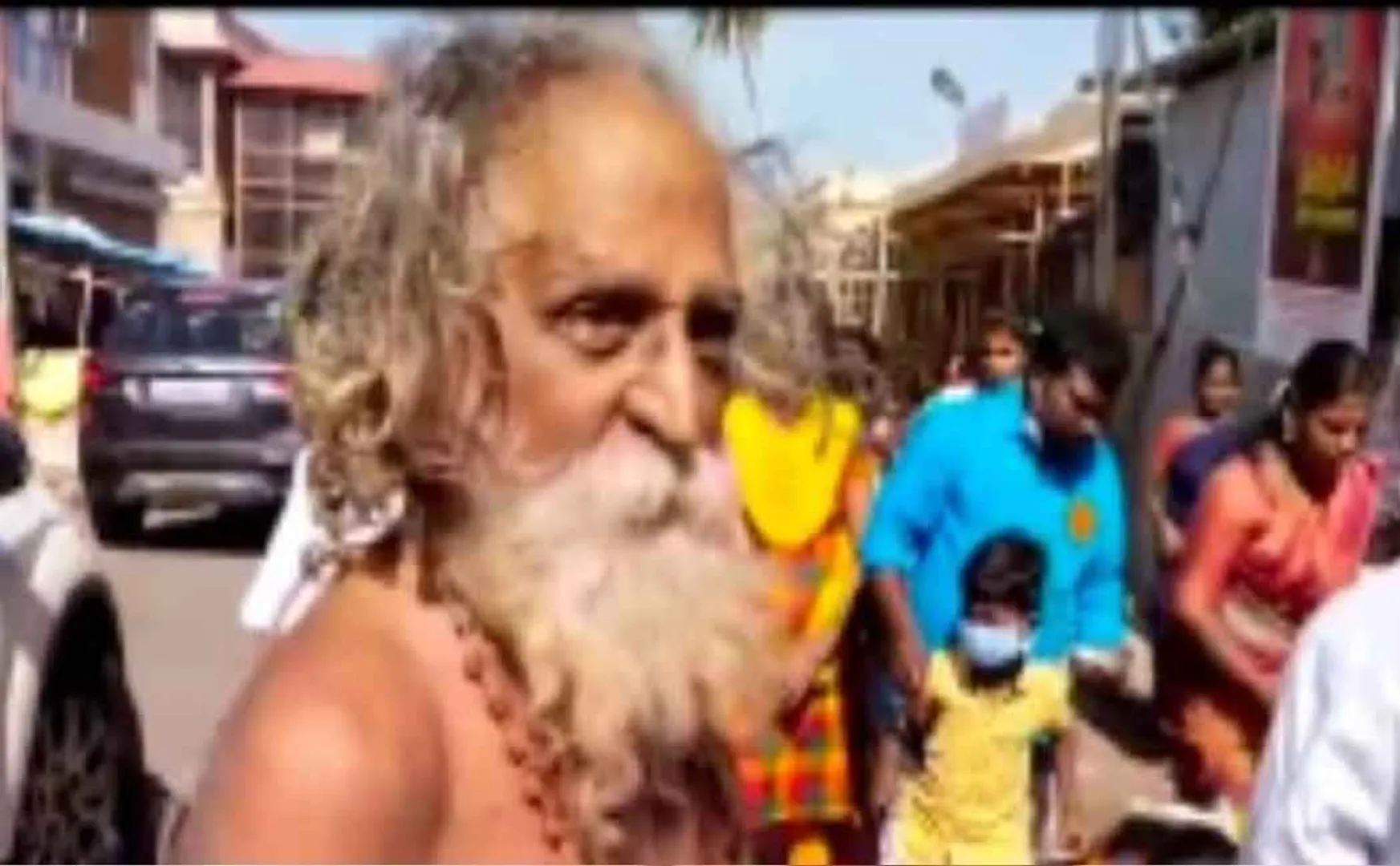 78 year old devotee praying in a strange way 