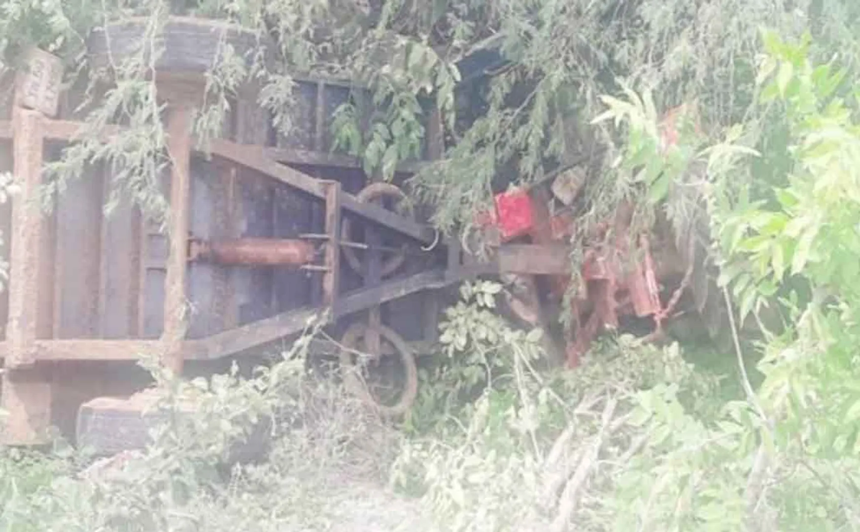 Tractor crashes into 15-foot ditch