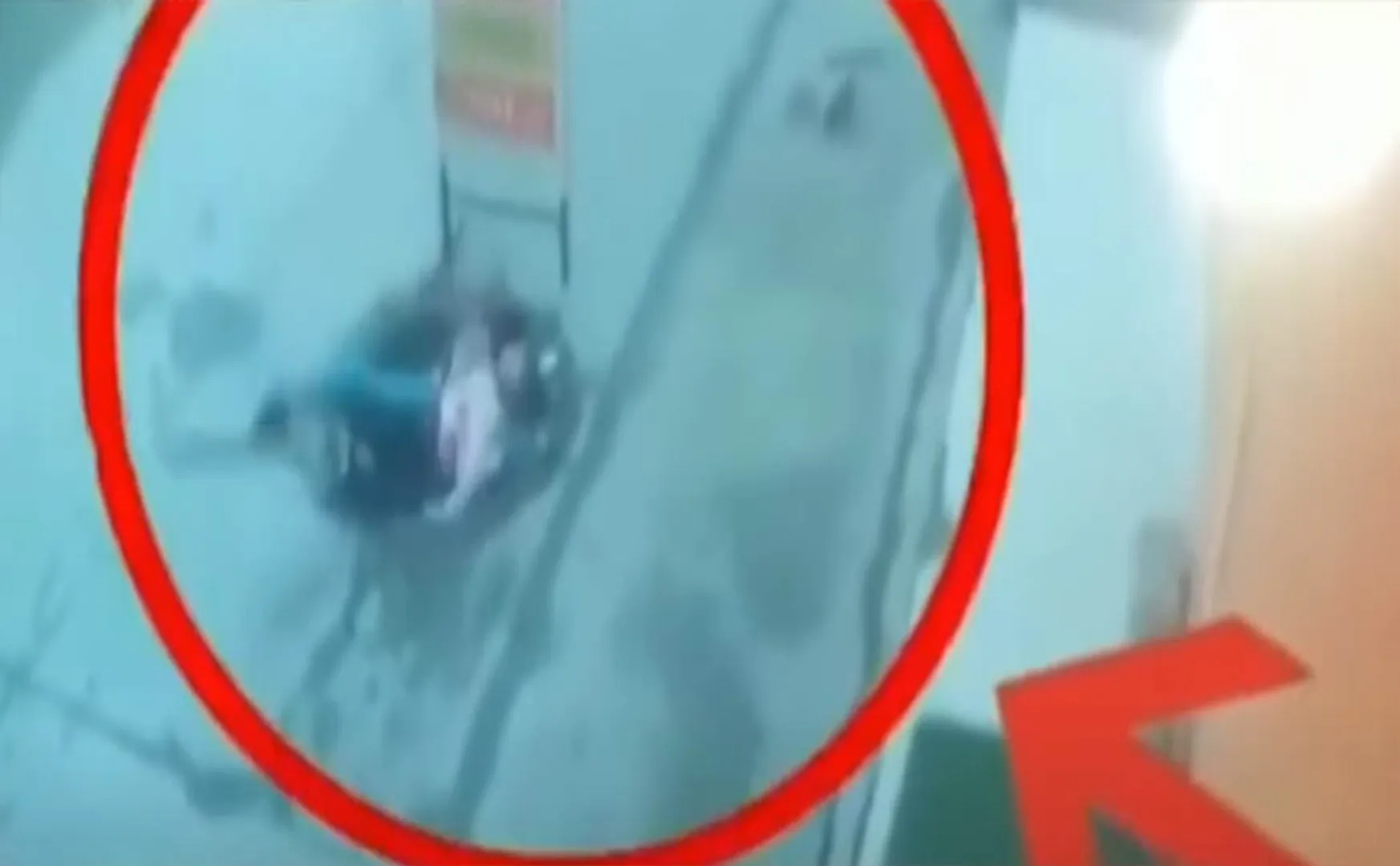CCTV footage of a mother and child falling into a ditch!