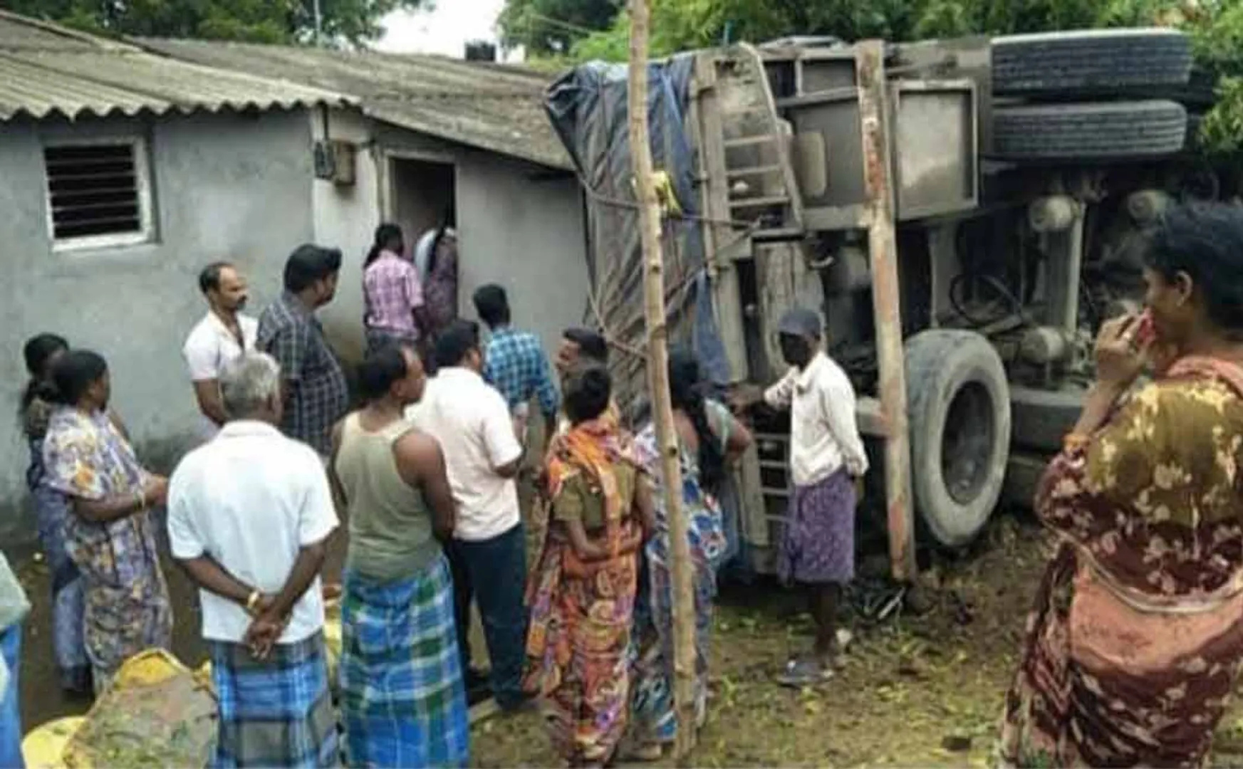 Leaning truck over houses!