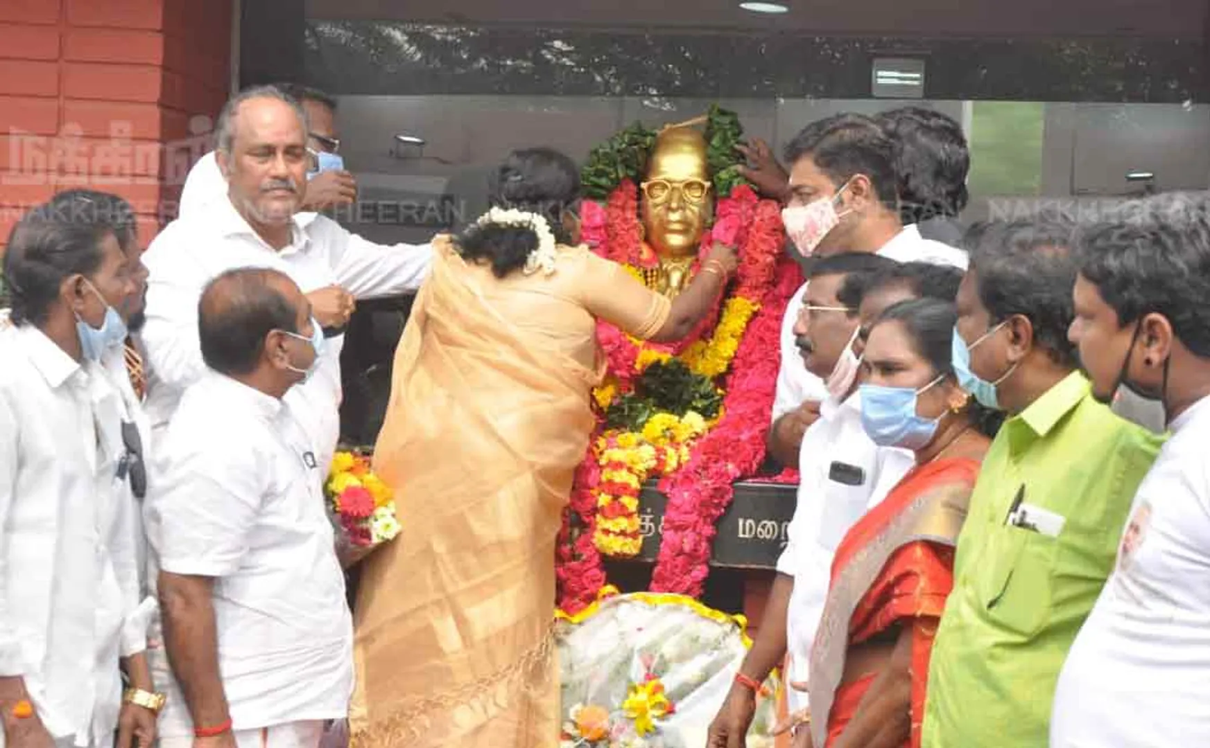 Governor pays homage to Ambedkar statue by wearing garland