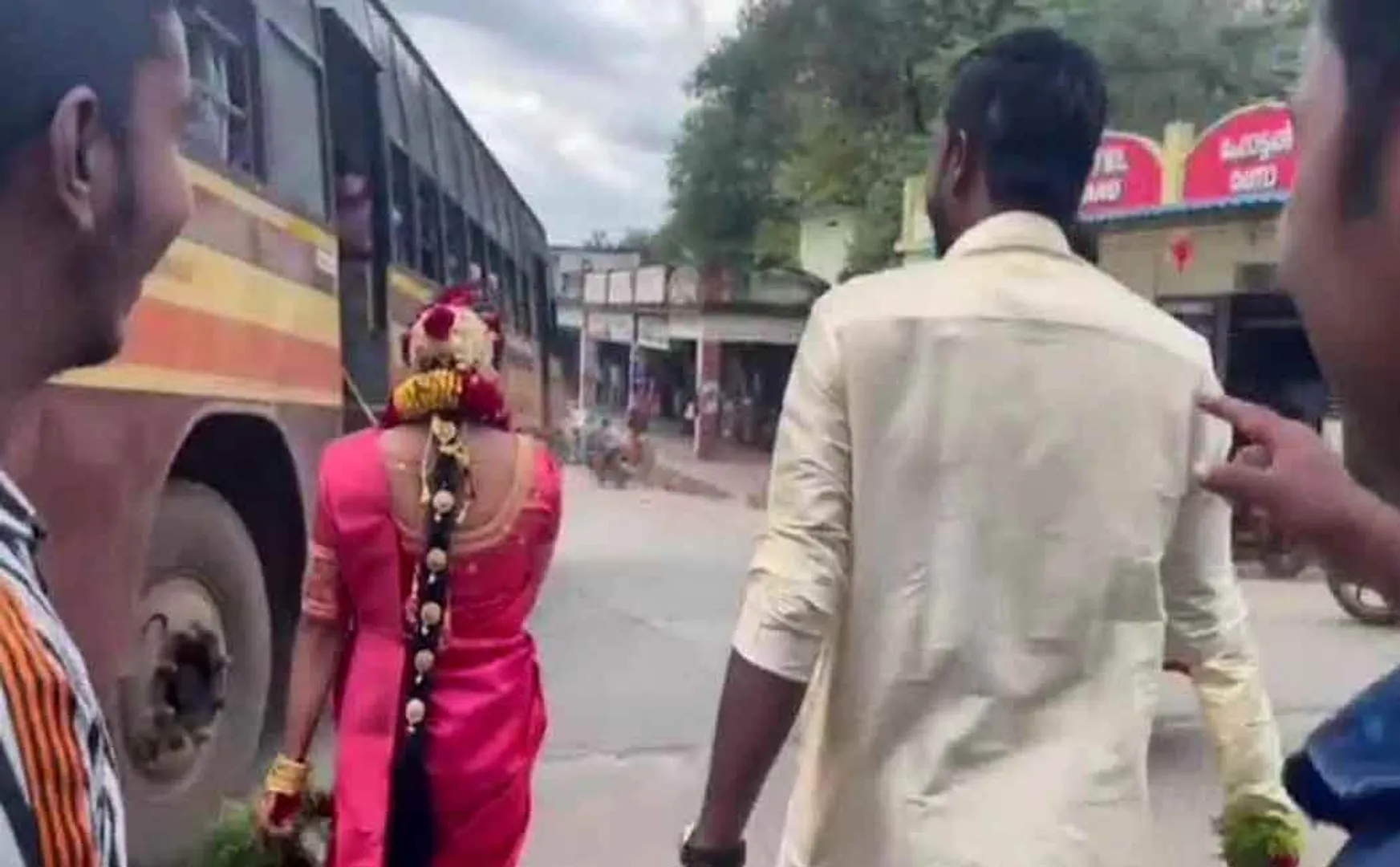 The bride and groom who went to the bus station after the wedding 