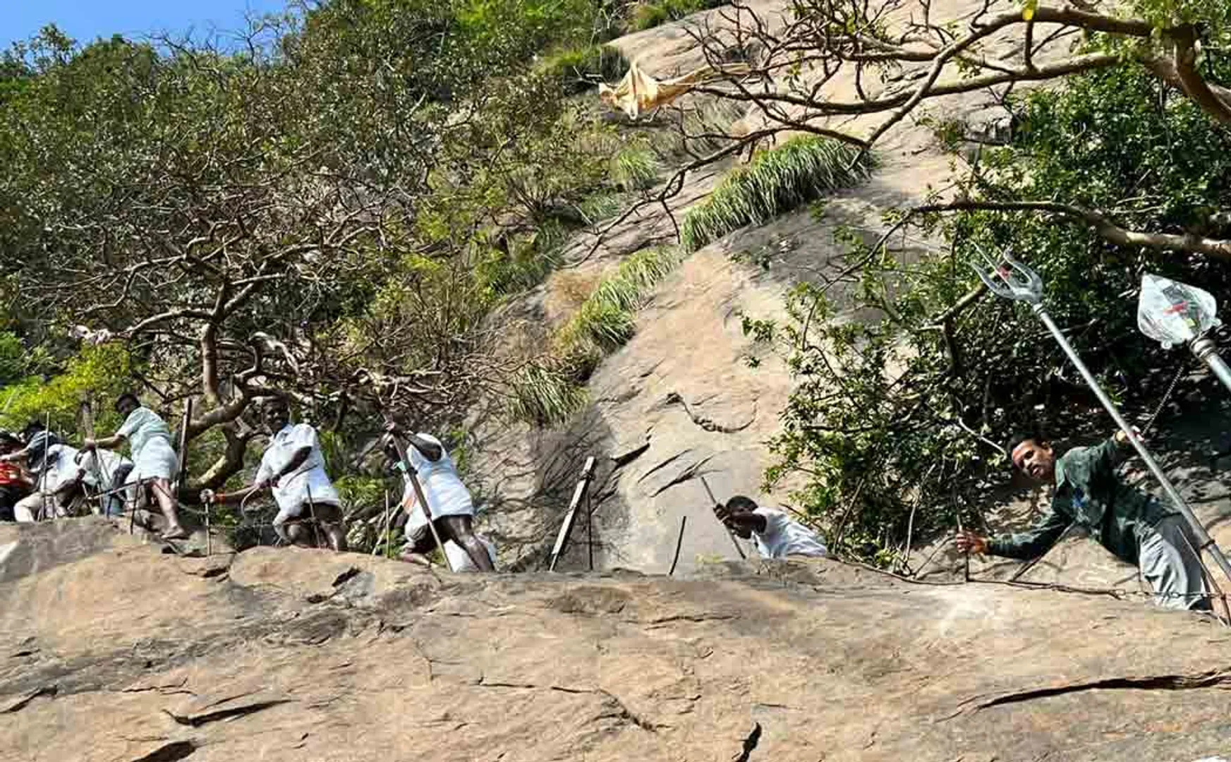 MP climbs 4560 feet for a temple without lights!