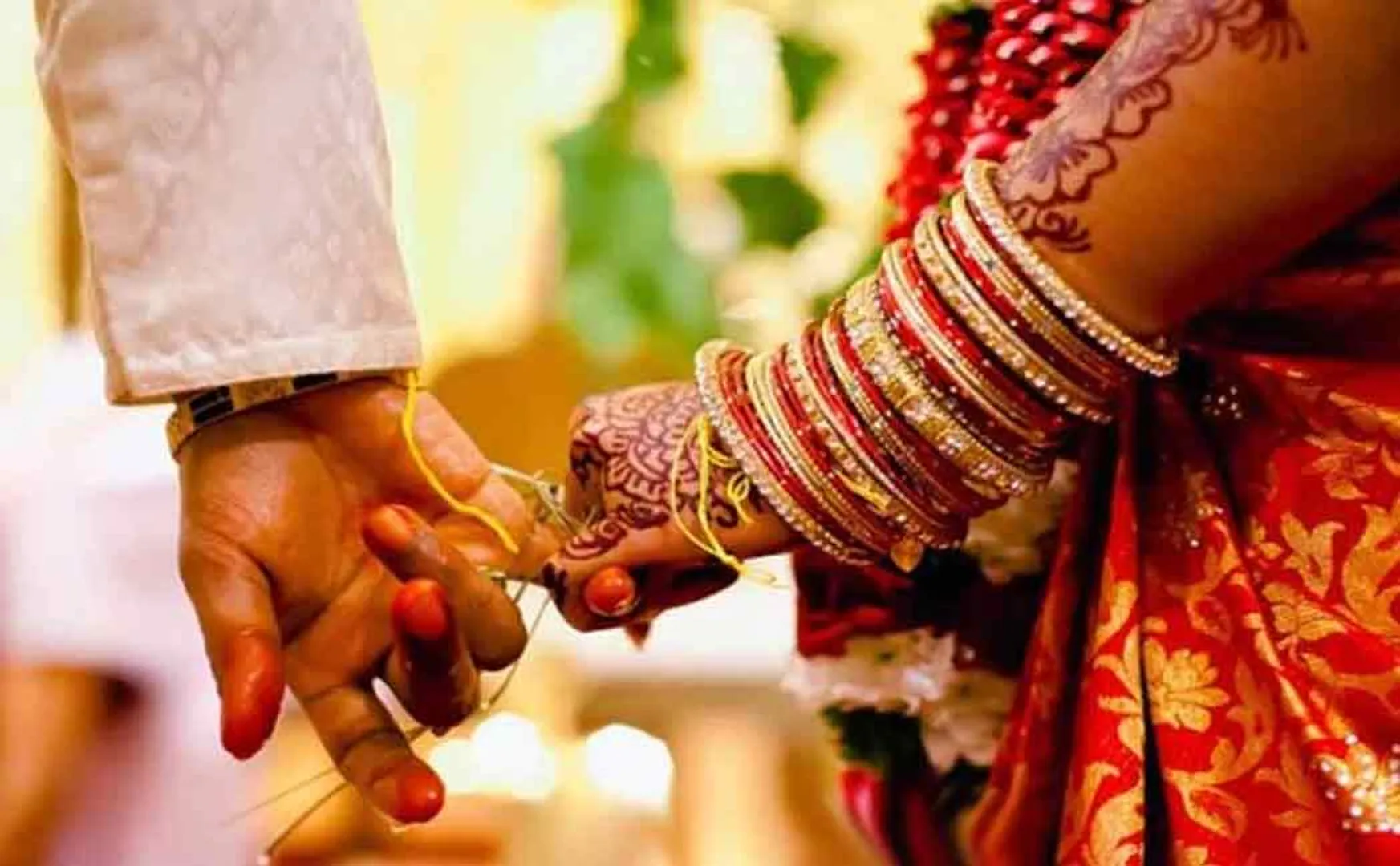 The groom changes by the action of the bride