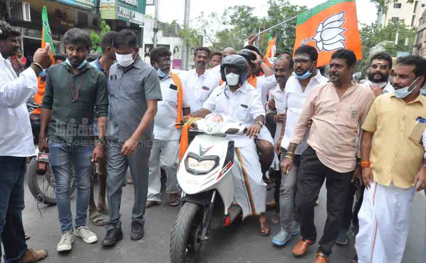 The two-wheeler campaign was carried out by L. Murugan 