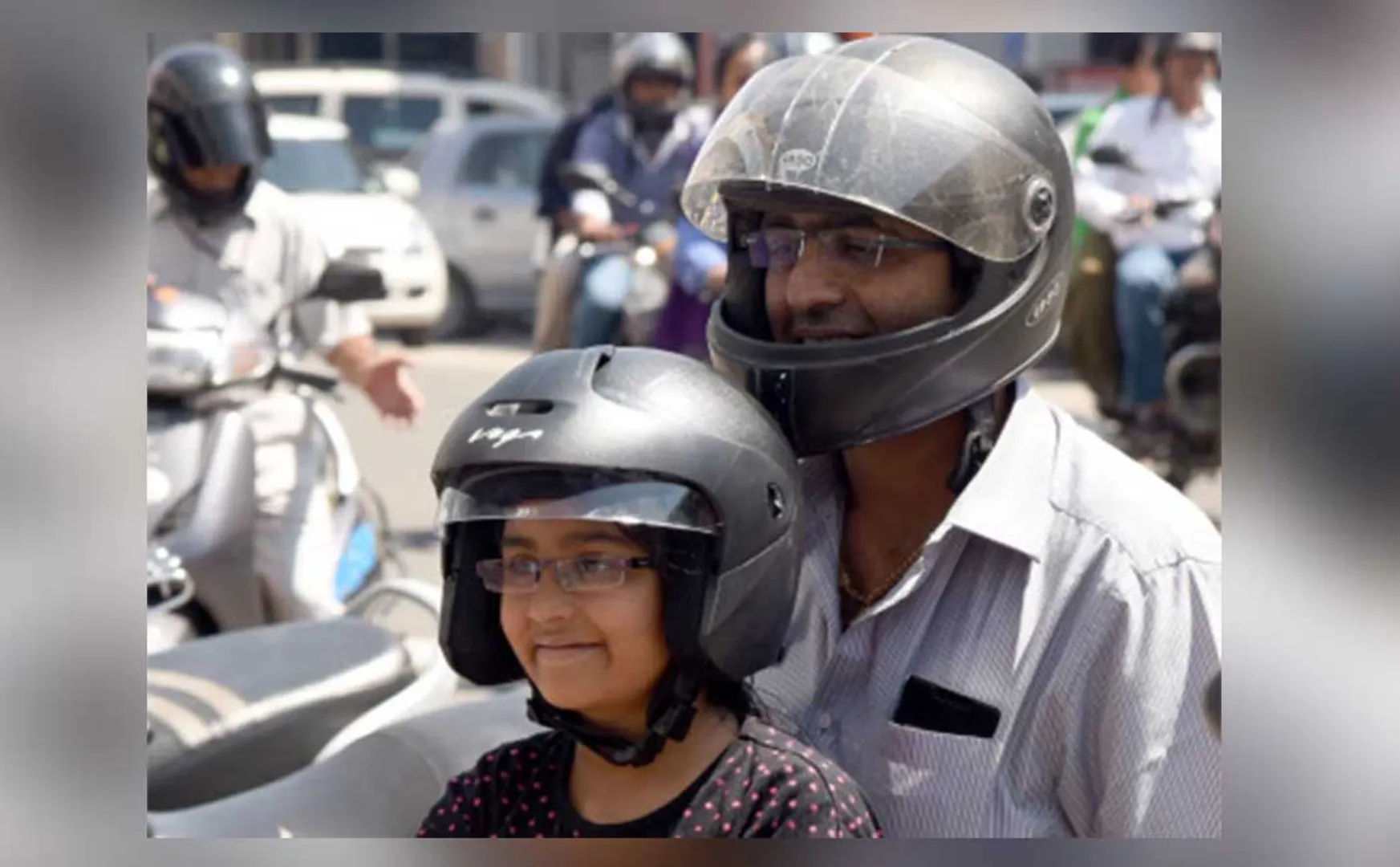 Helmets are mandatory for children traveling in two-wheelers!