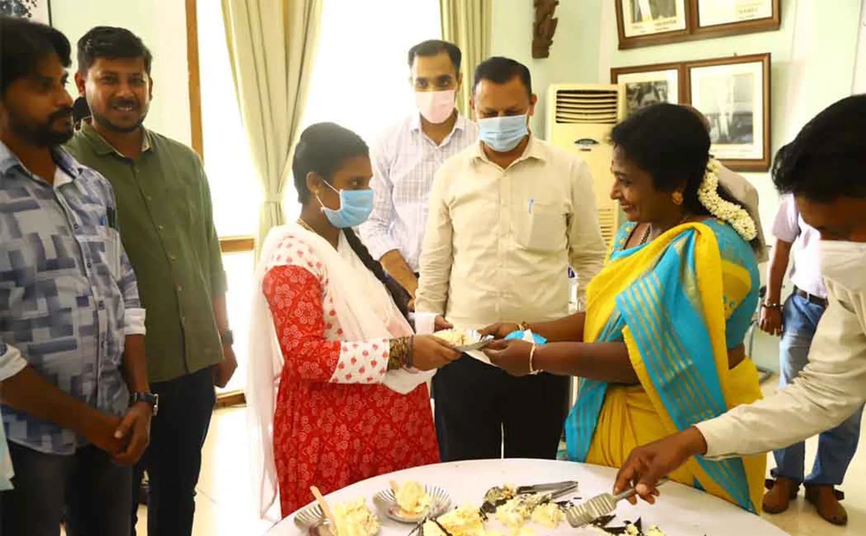 One year since taking office as the Deputy Governor of Pondicherry ... Tamilisai celebrating by cutting the cake with the staff!