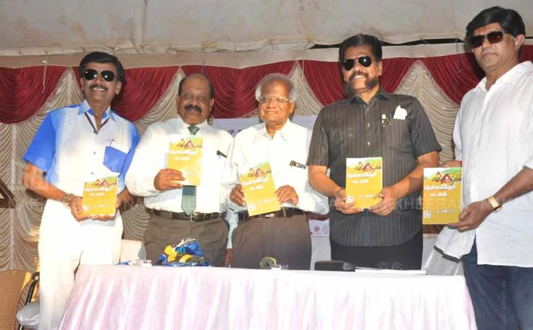 Nakkeeran author at the book launch of Nellavikum Padalam