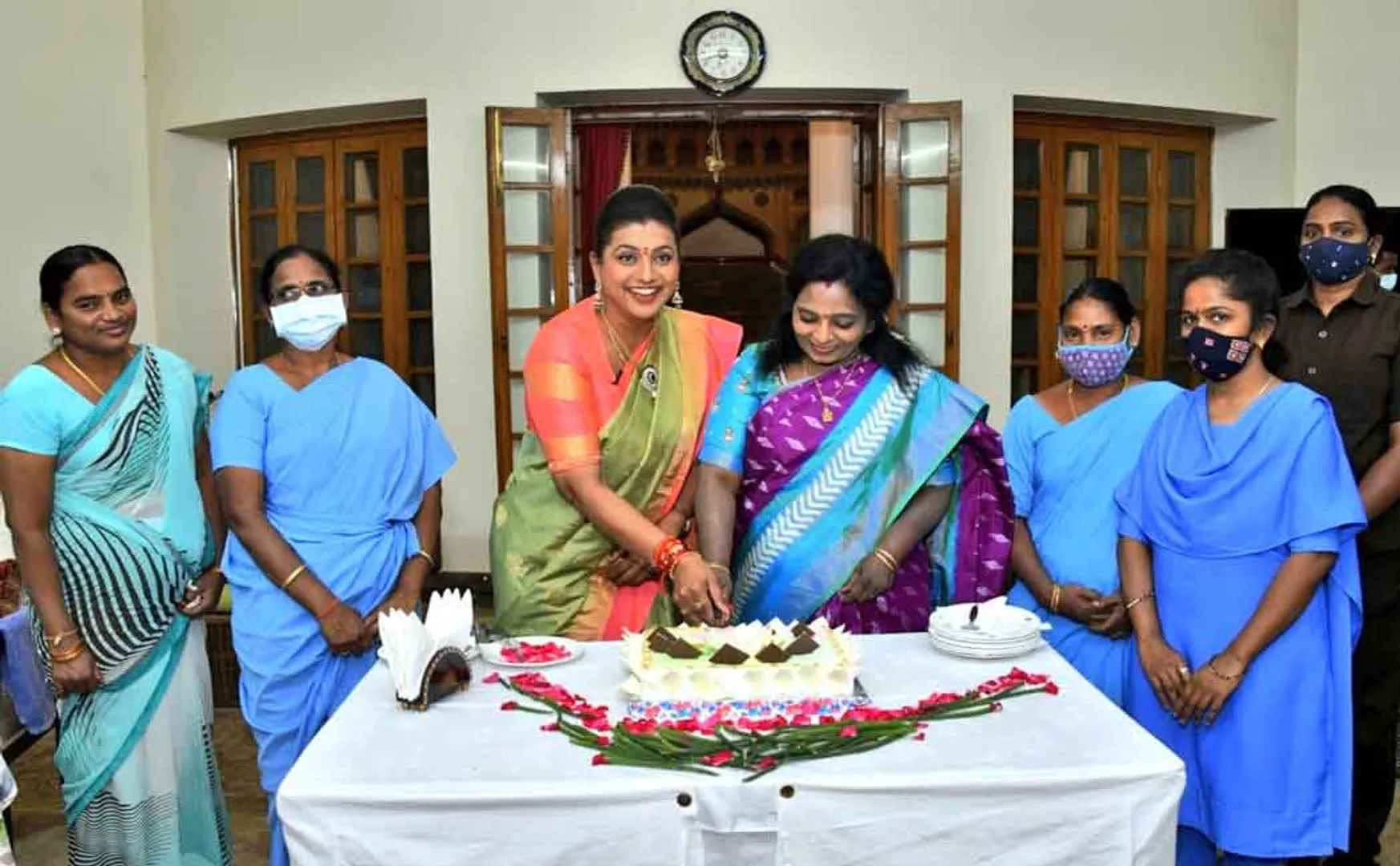 governor tamilisai and mla roja celebrated the international womenrs day 
