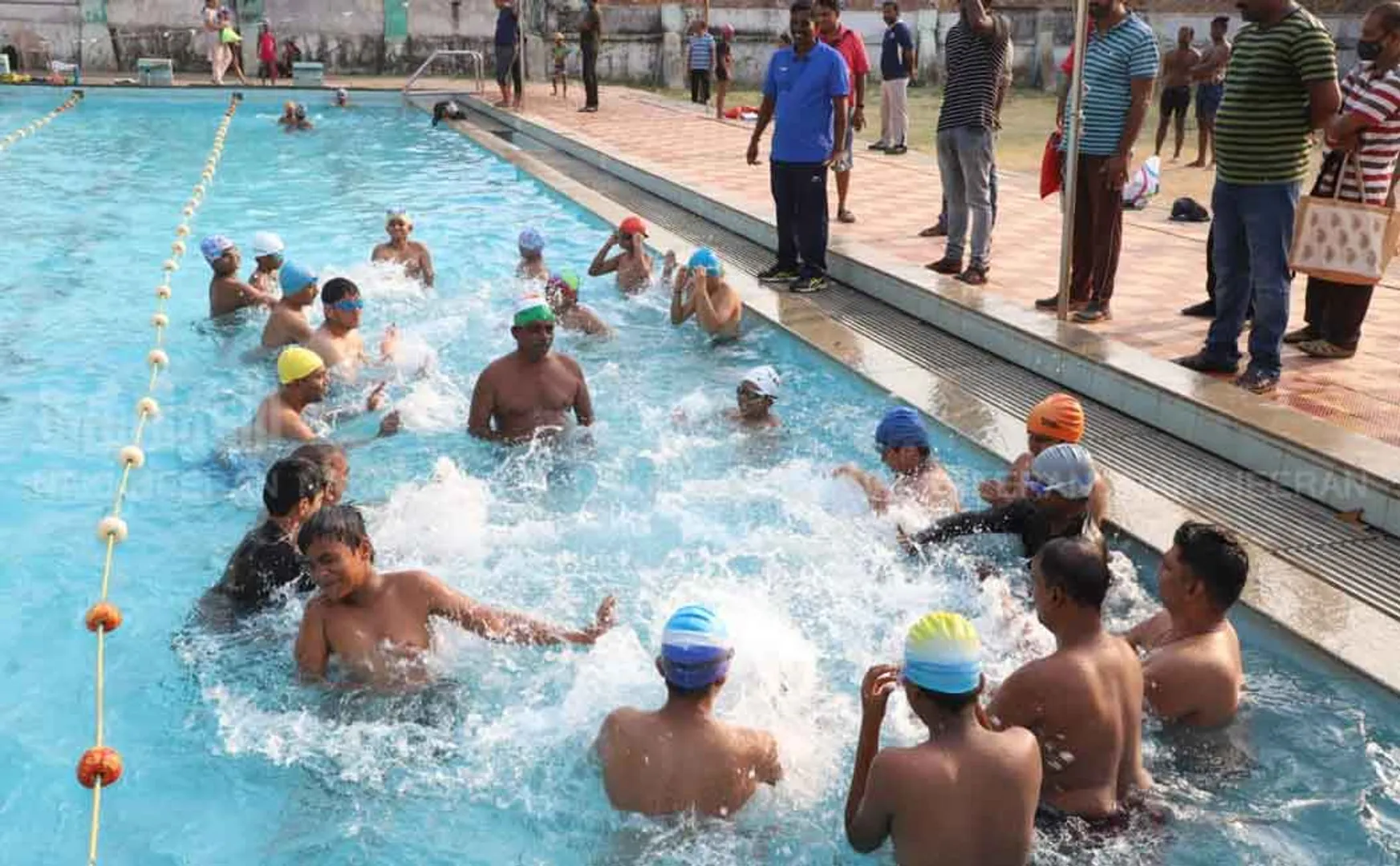 Kids playing in swimming pool  