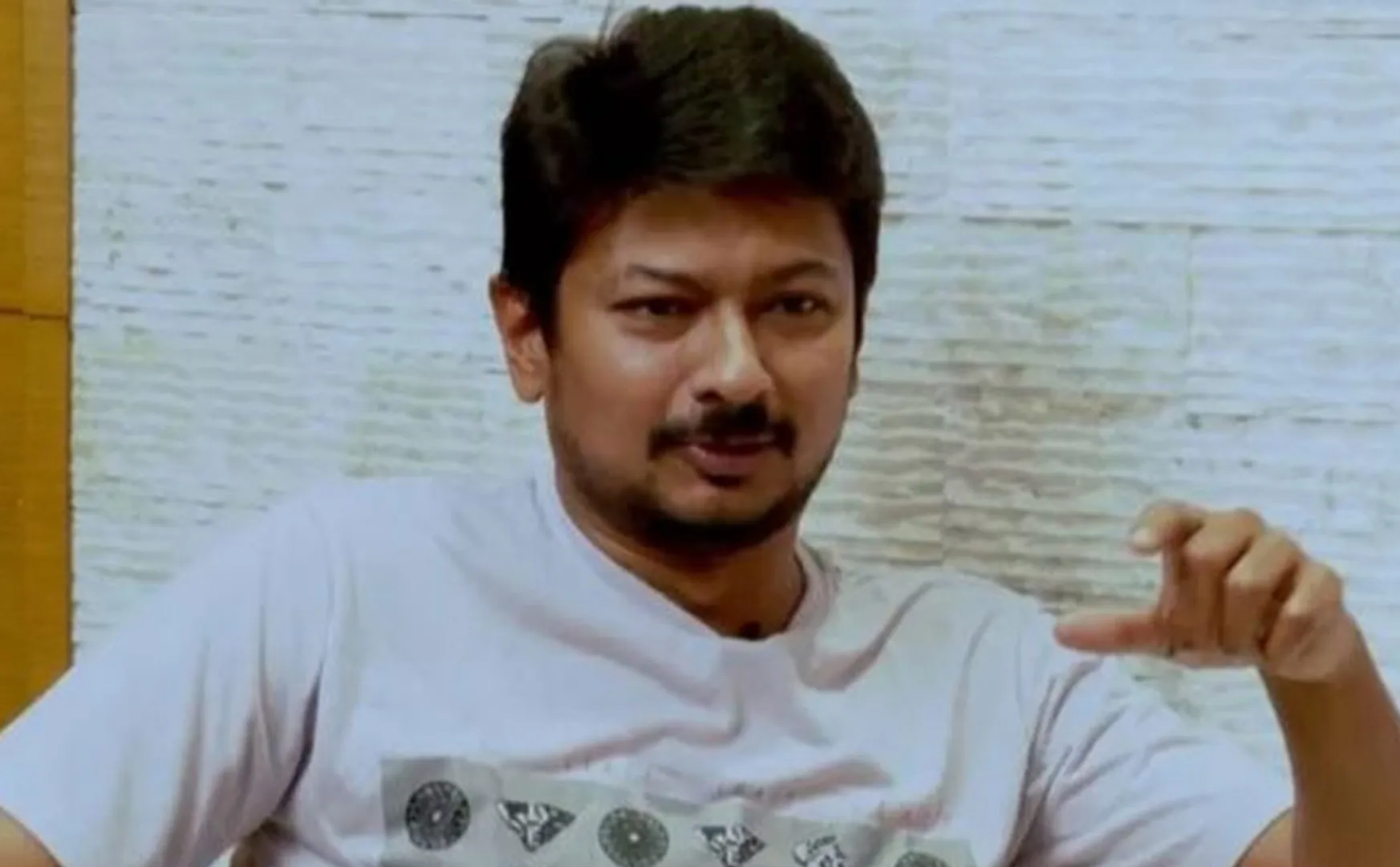 case filed against police man kathiravan udhayanidhi stalin nenjukku needhi banner