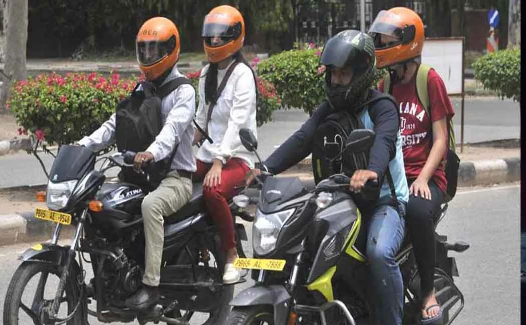 Rear seat helmet mandatory on two wheelers!