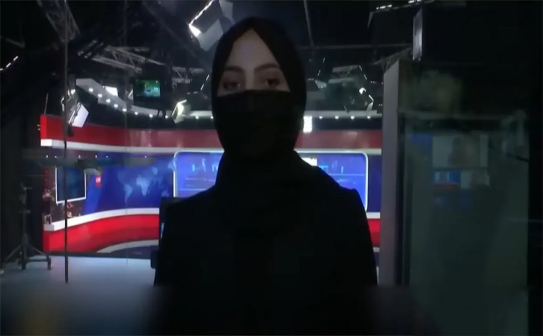 Women reading the news wearing a burqa on TV!
