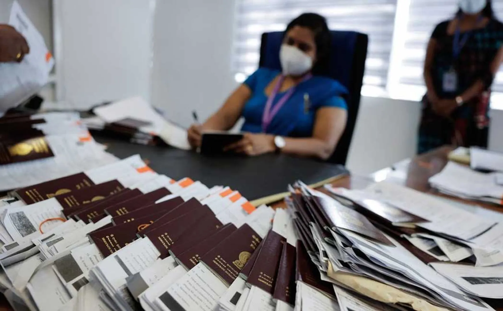 People waiting for passports to leave the country!