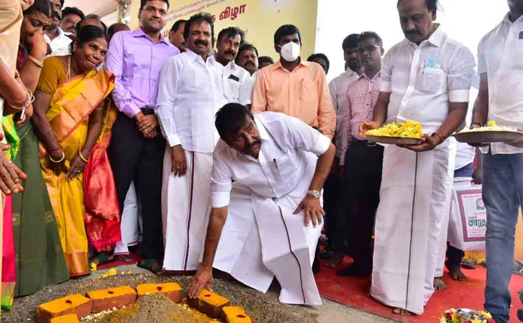Minister K.N. Nehru initiated the gravel filling work!