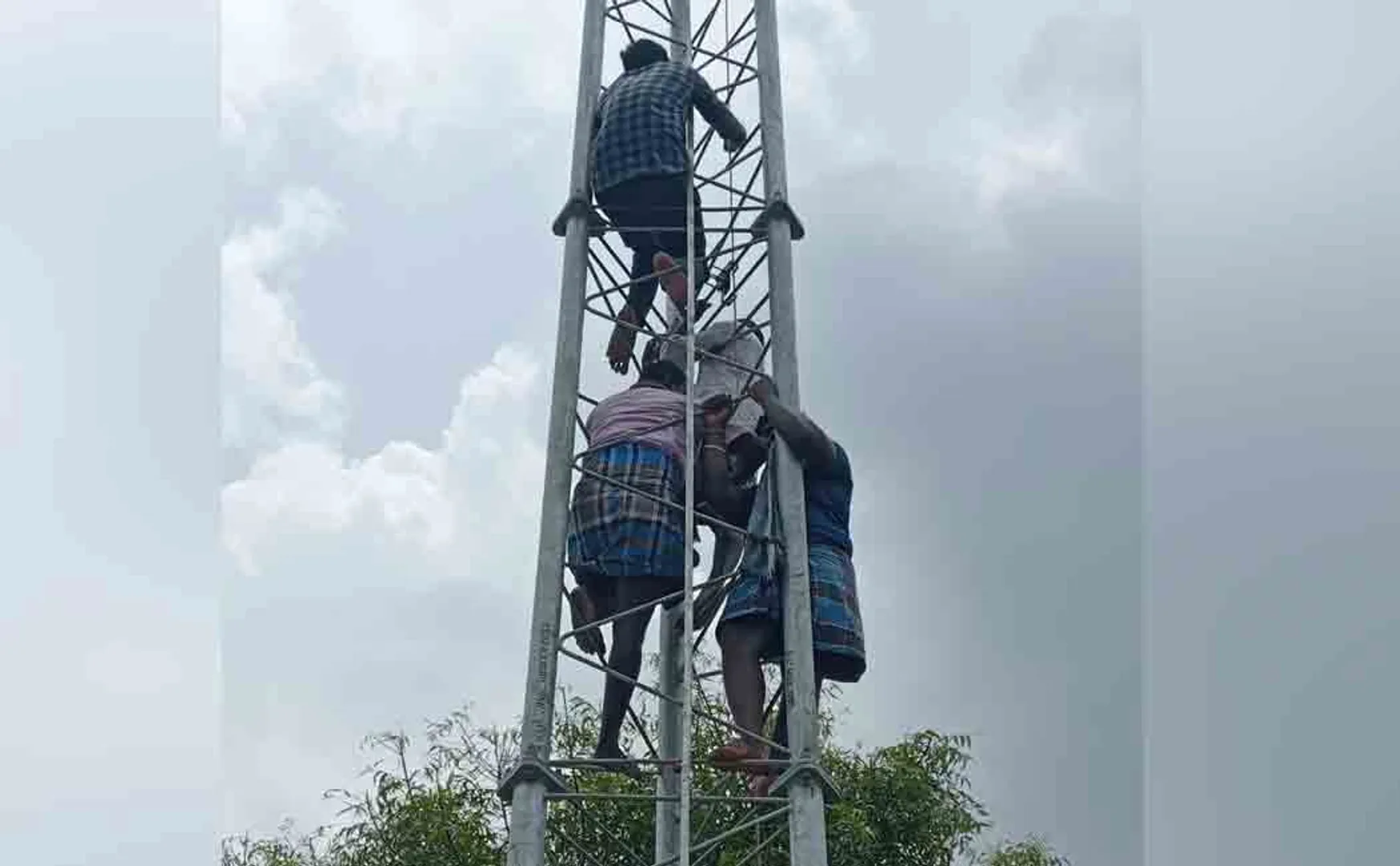 People on cellphone tower 