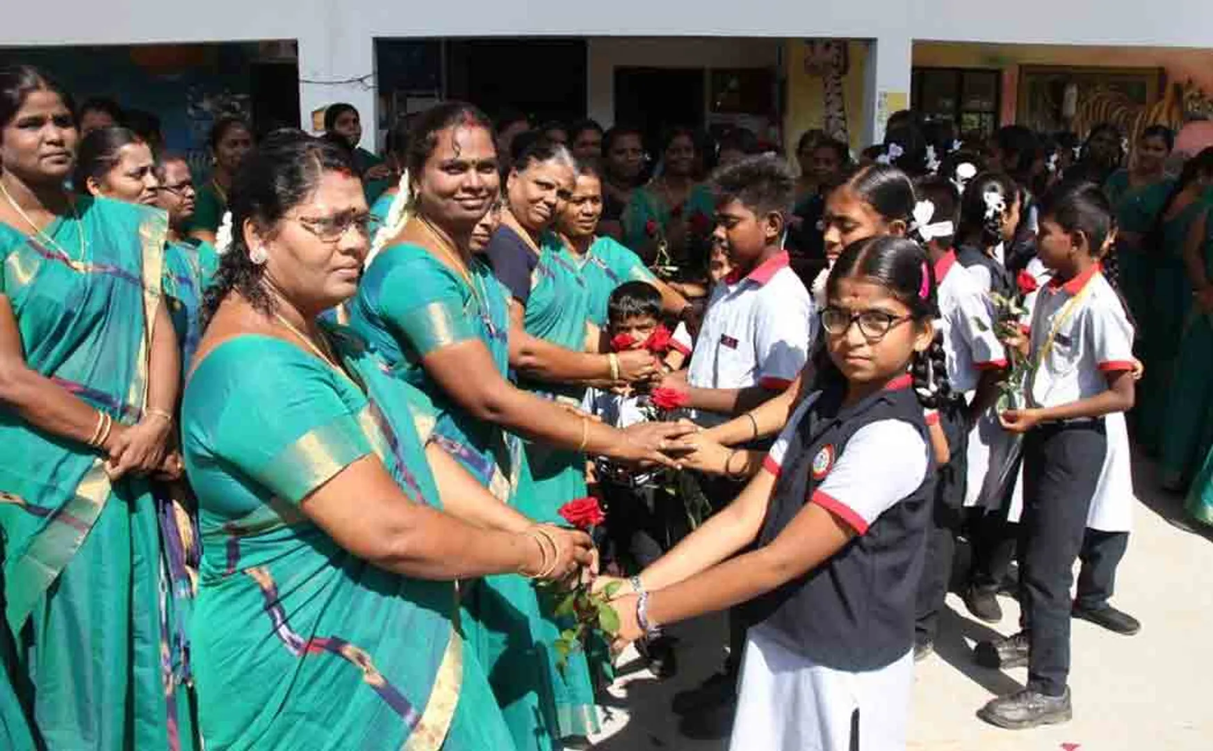 Students congratulated teachers by giving roses!