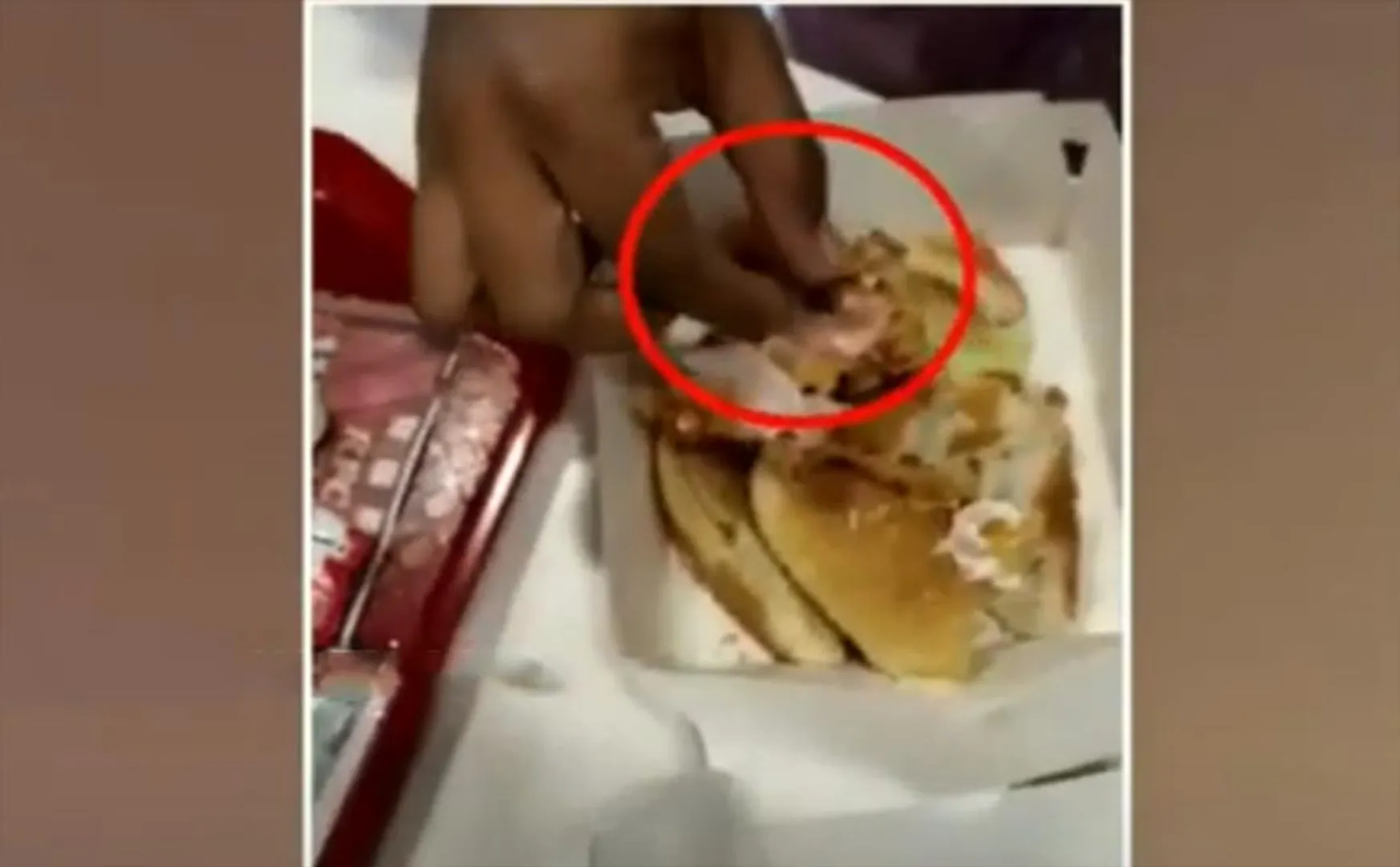 Plastic glove on burger... viral video!