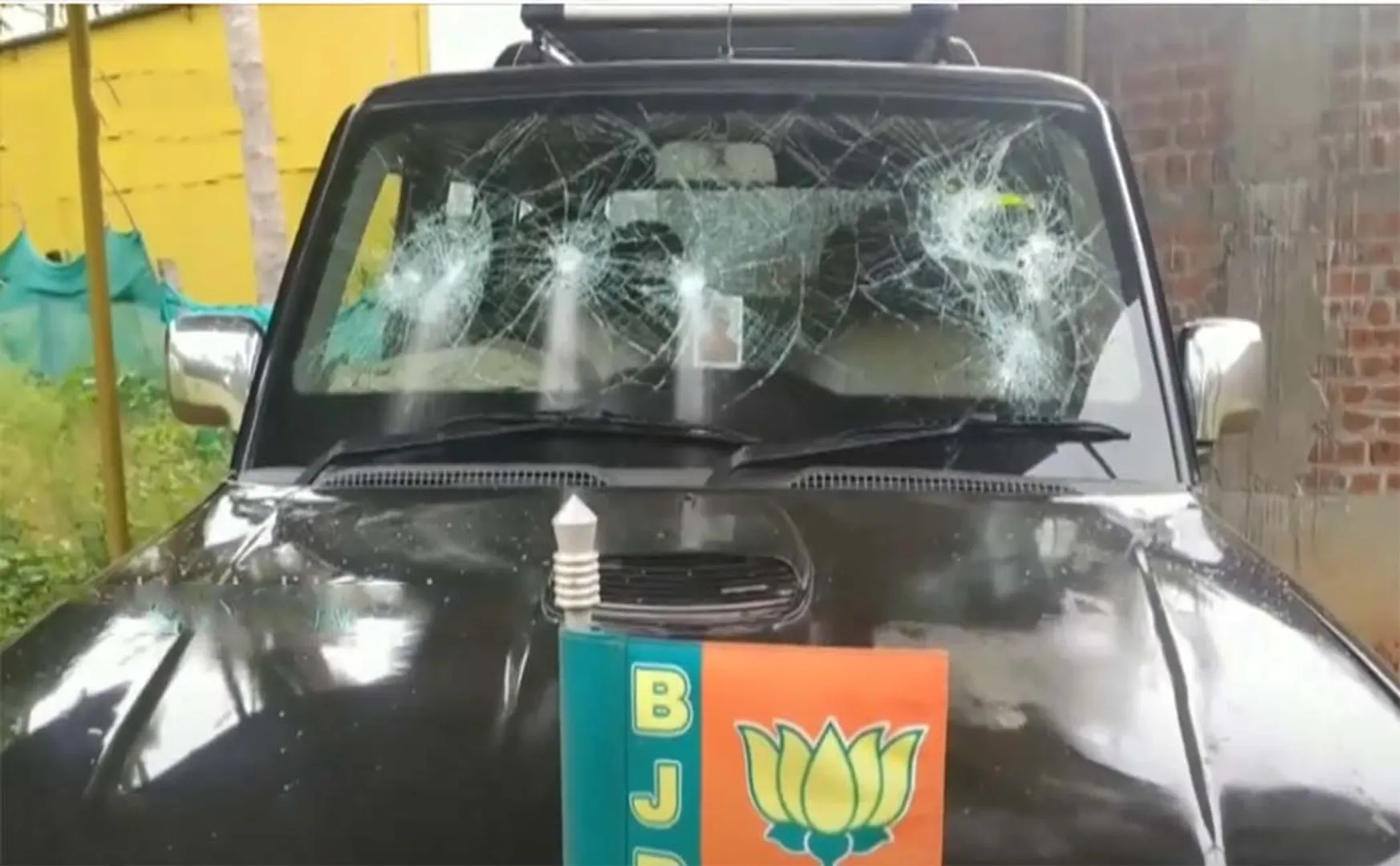BJP Administrator's car glass broken!