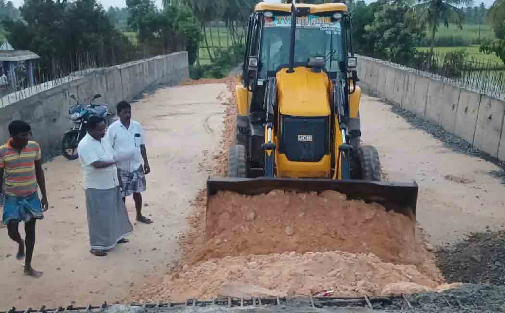 Public who make road between river 