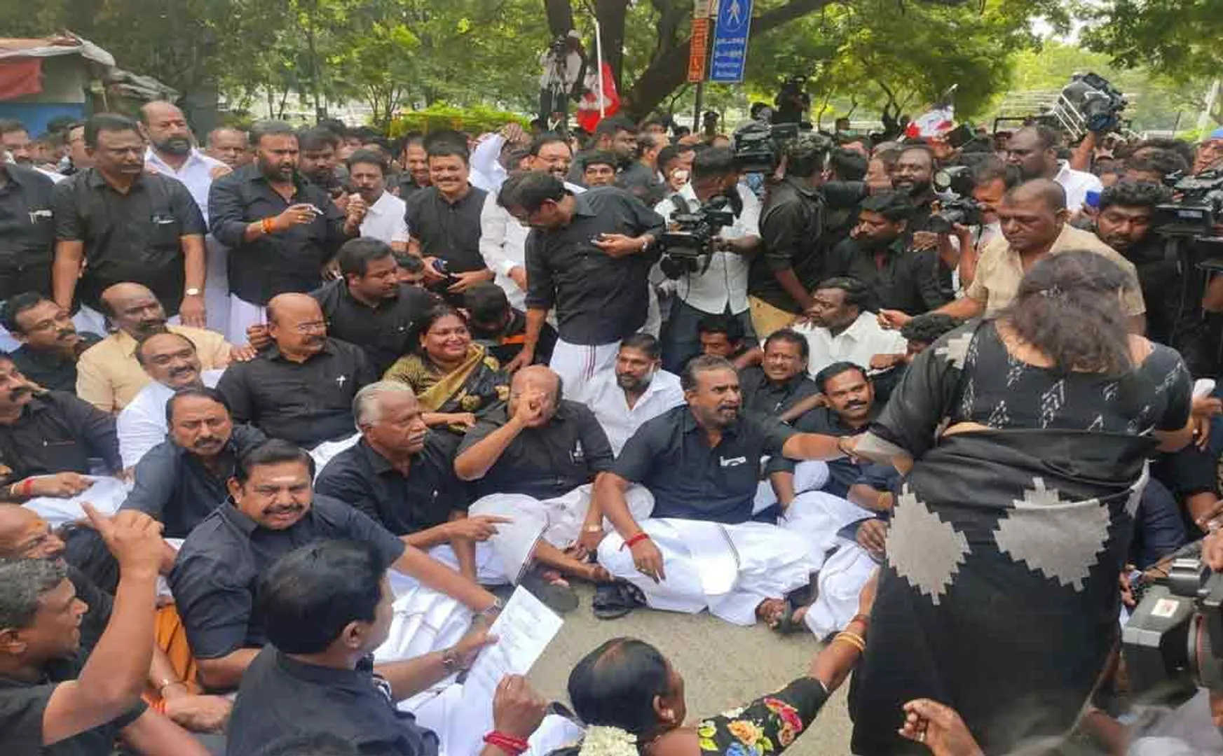 "democracy took place" Palaniswami's party staged a dharna on the road