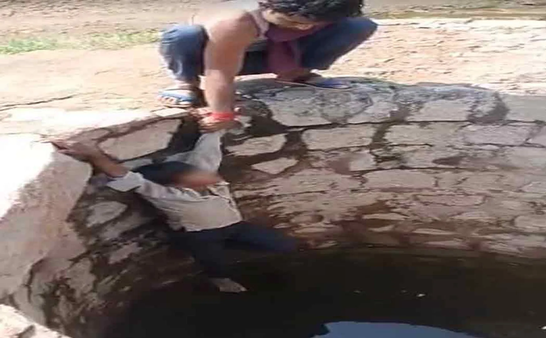 The boy was hanged from a well for stealing a cell phone