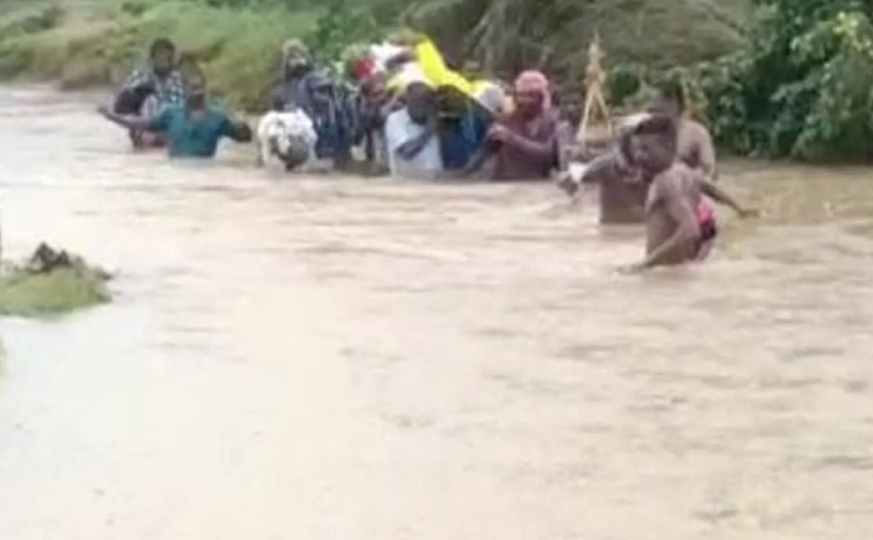 People walked through waist deep water river bridge broke
