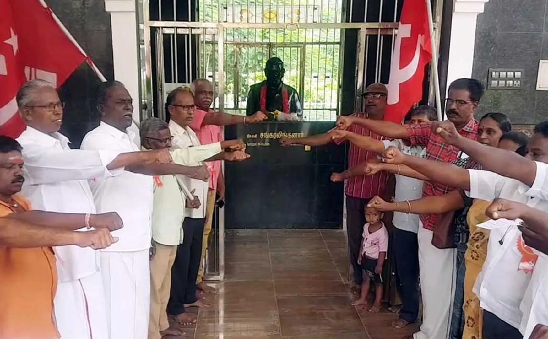 cpm homage Shankaralingan statue