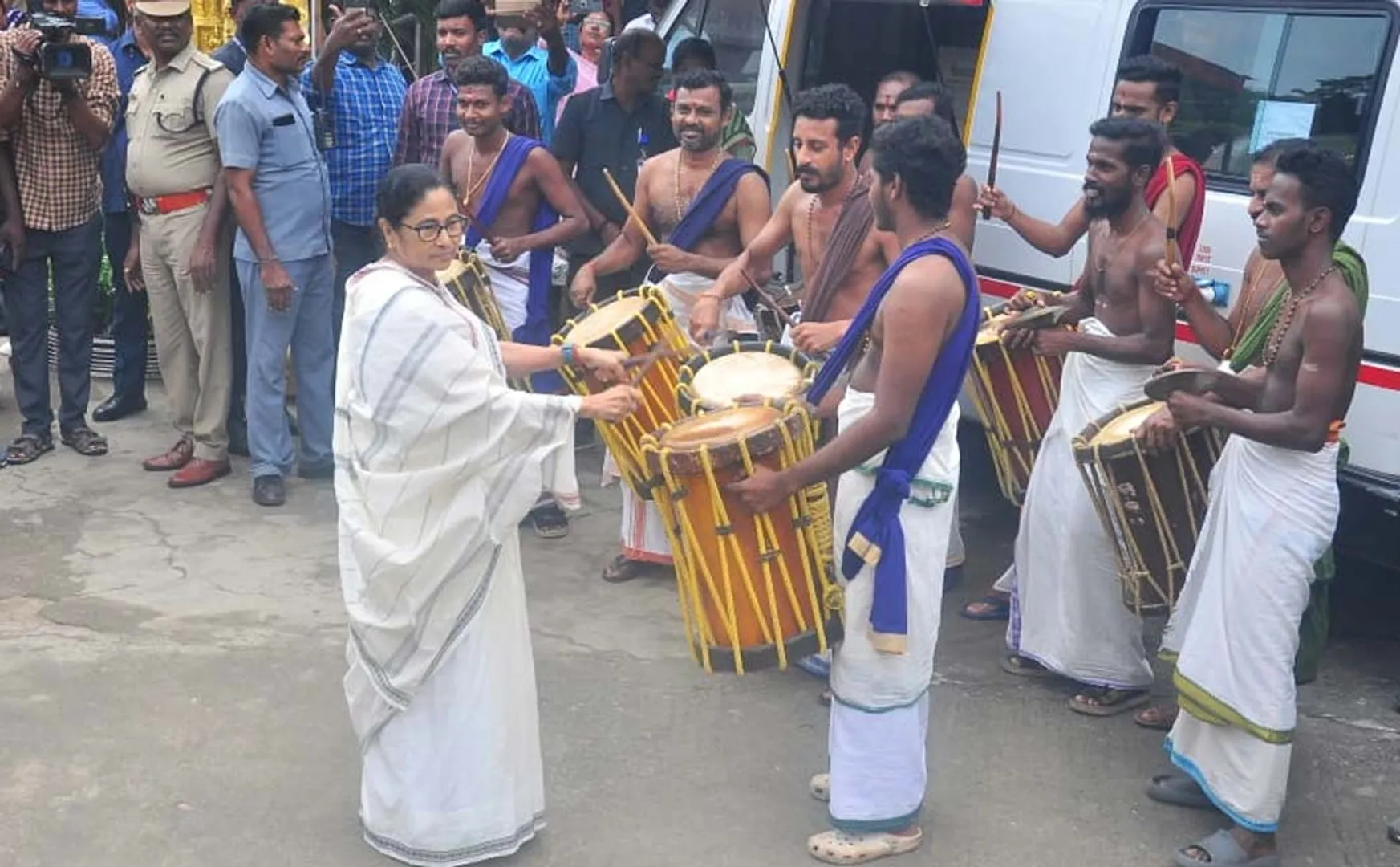 Mamata surprised playing kerala drum Satabhishek ceremony