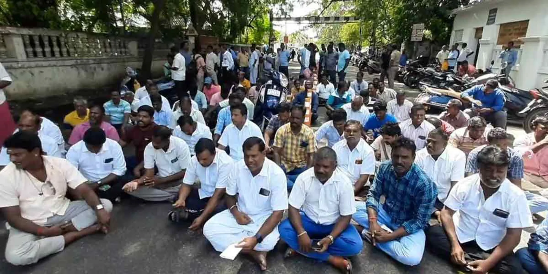 Power boat fishermen block the road to stop the sale of foreign fish