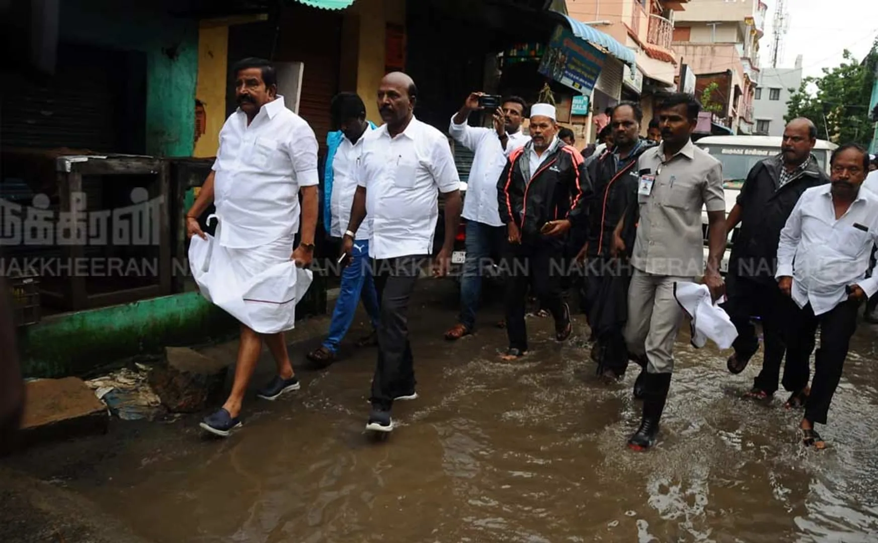 Ministers inspecting rain water logged areas 