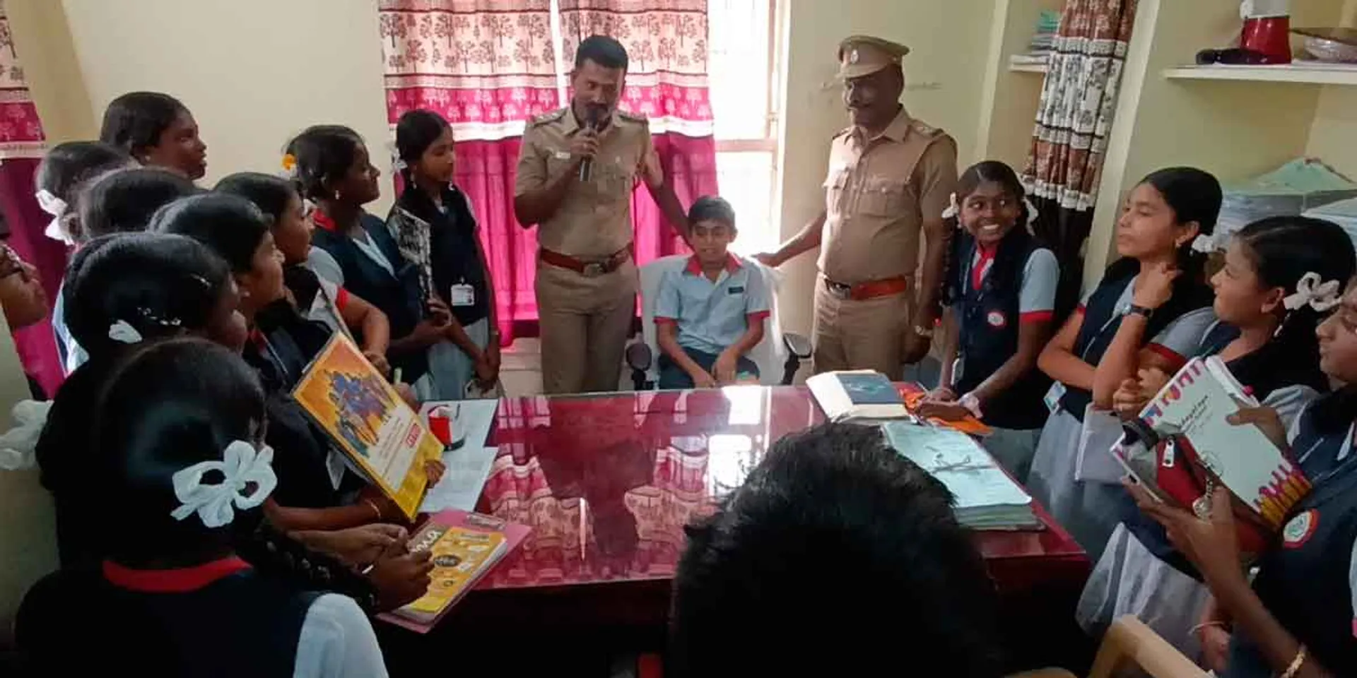 The police inspector made the schoolgirls sit in his chair and saw their beauty