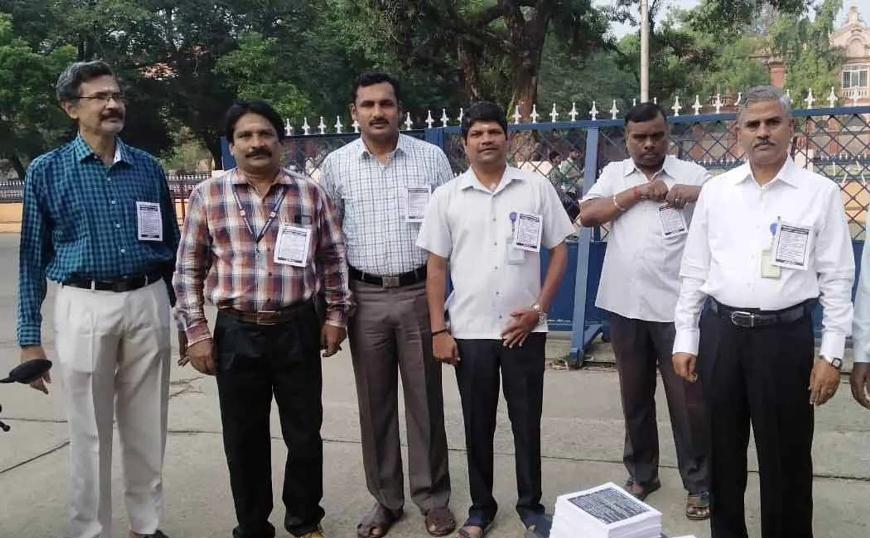 Annamalai University staff wore black card  to emphasize 12-point demands.