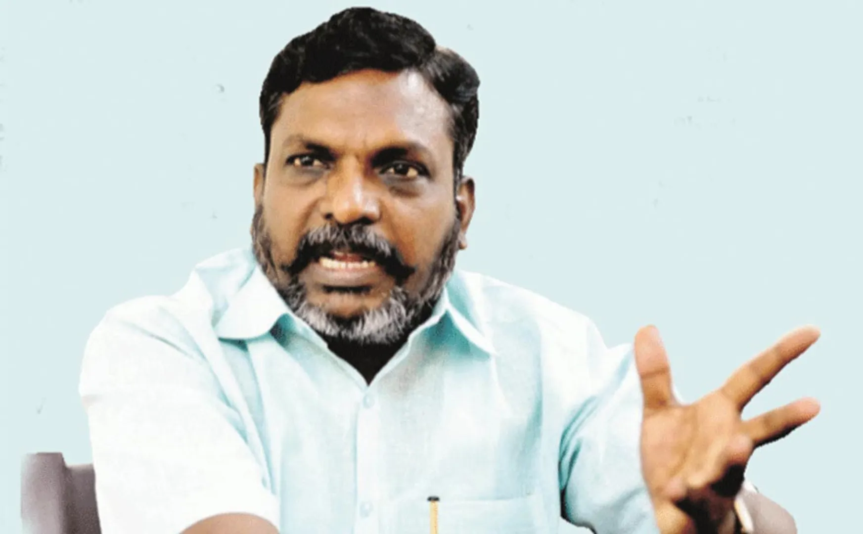 thirumavalavan condemns Hindi imposition water bottle