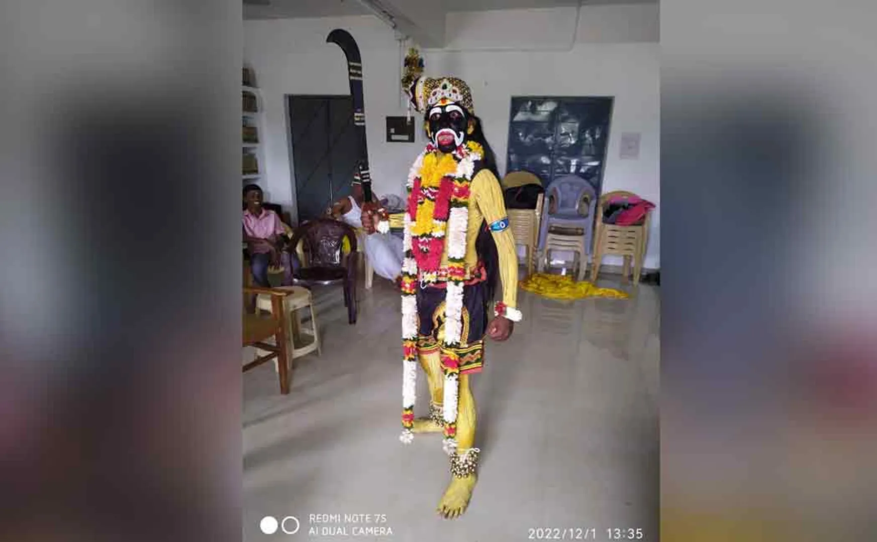 A student dressed as Karupanasamy 