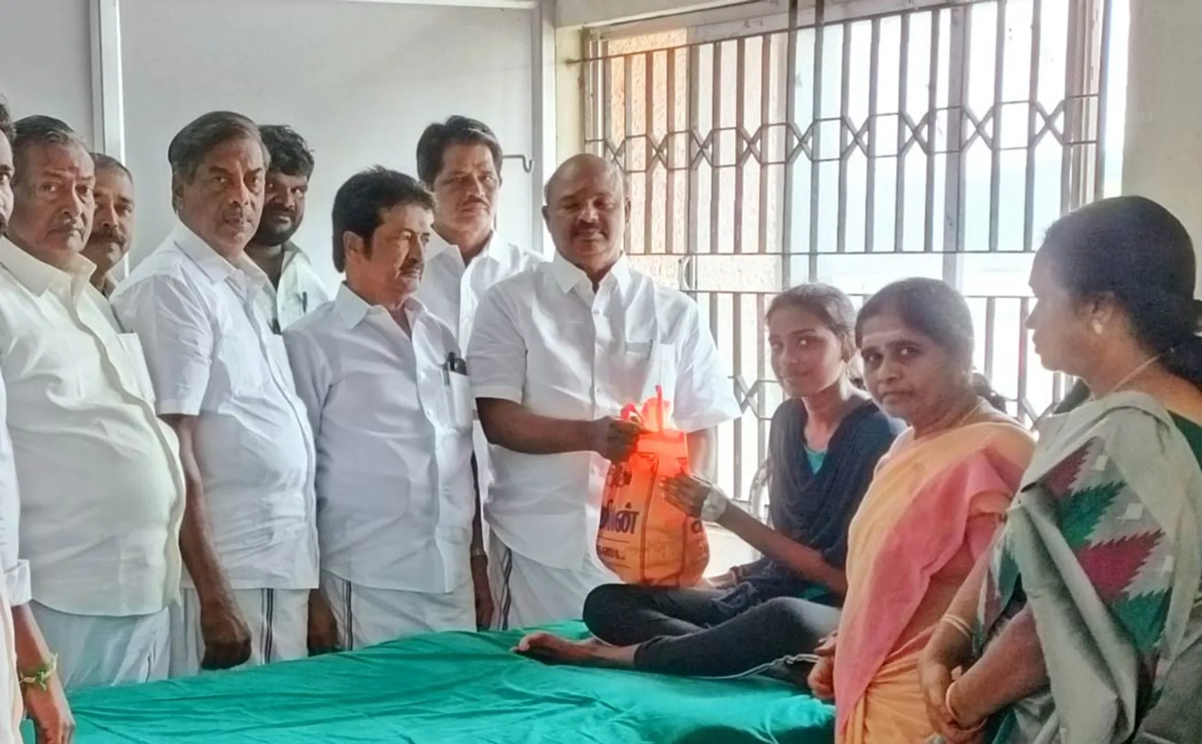 MLA ka pandiyan personal comforts the students undergoing treatment in the hospital