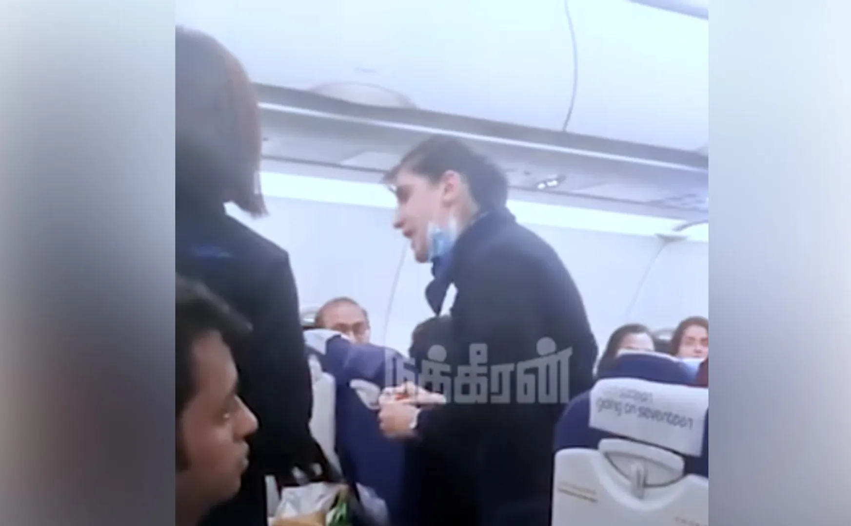  passenger gave a befitting reply  Airhostess who spoke low videos goes viral