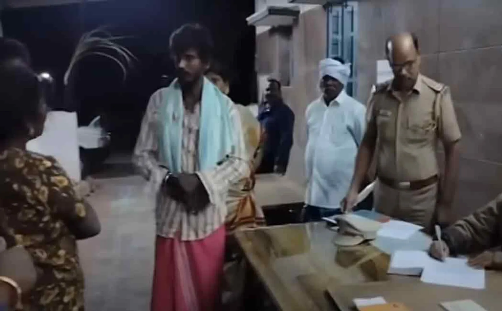 Drunken woman complains to police station, stirs in Dharmapuri