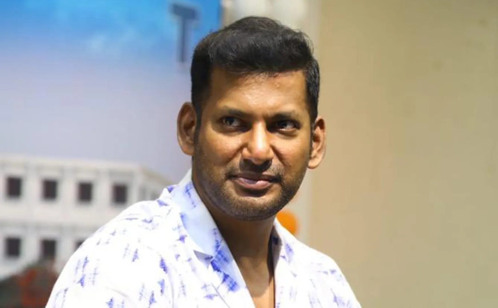 vishal tattooed late cm mgr face in his chest 