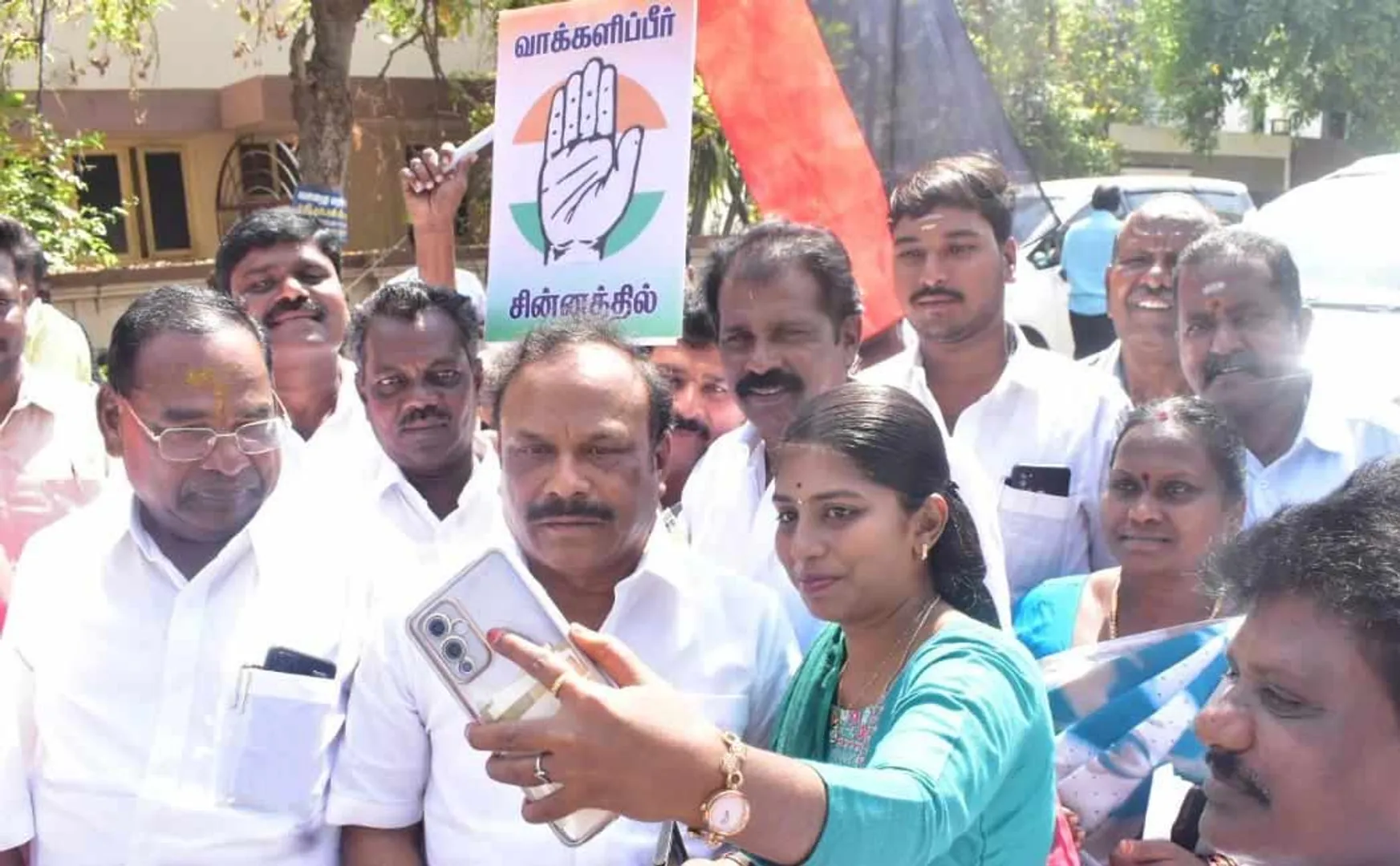 Erode byelection minister cv Ganesan selfie 