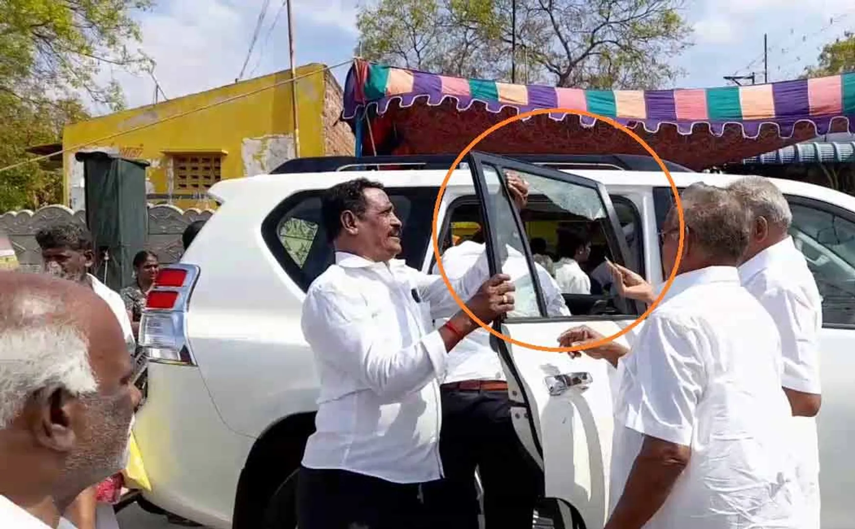 Minister's car window broken due to firecracker explosion virudhunagar