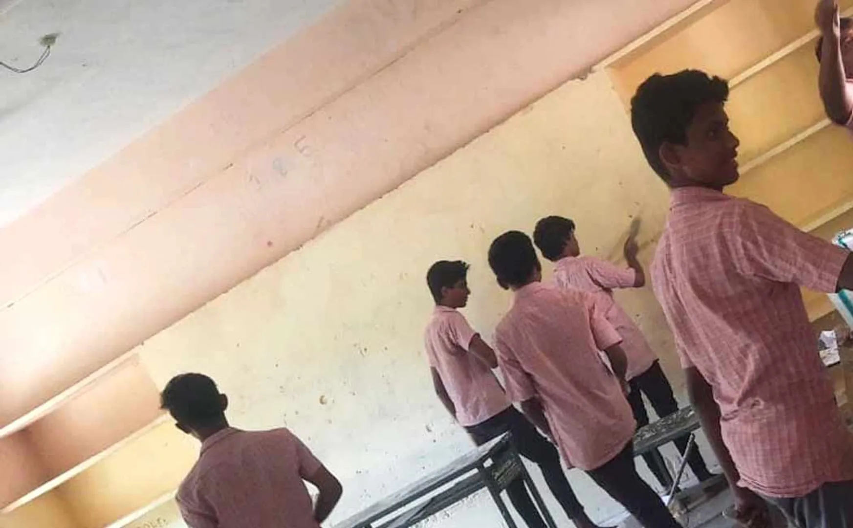Class 10 students paint their classrooms at their own expense