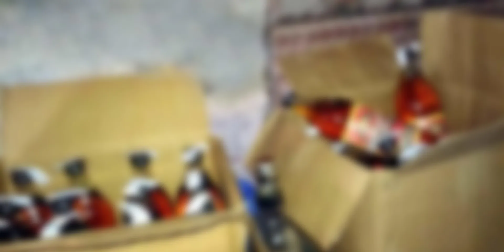 An old woman who sold liquor at her house was arrested following the public protest